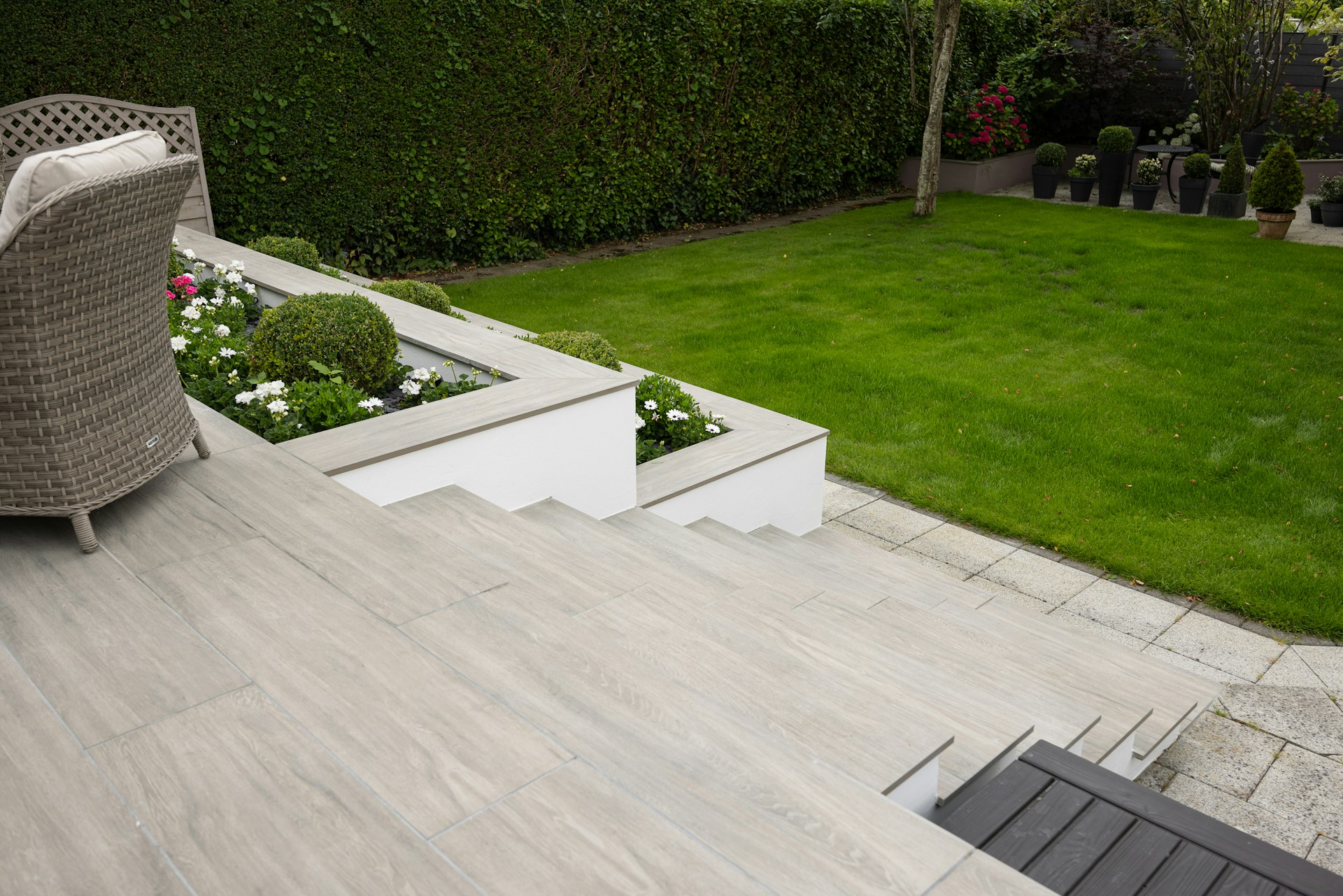 Close up image of tiled garden steps