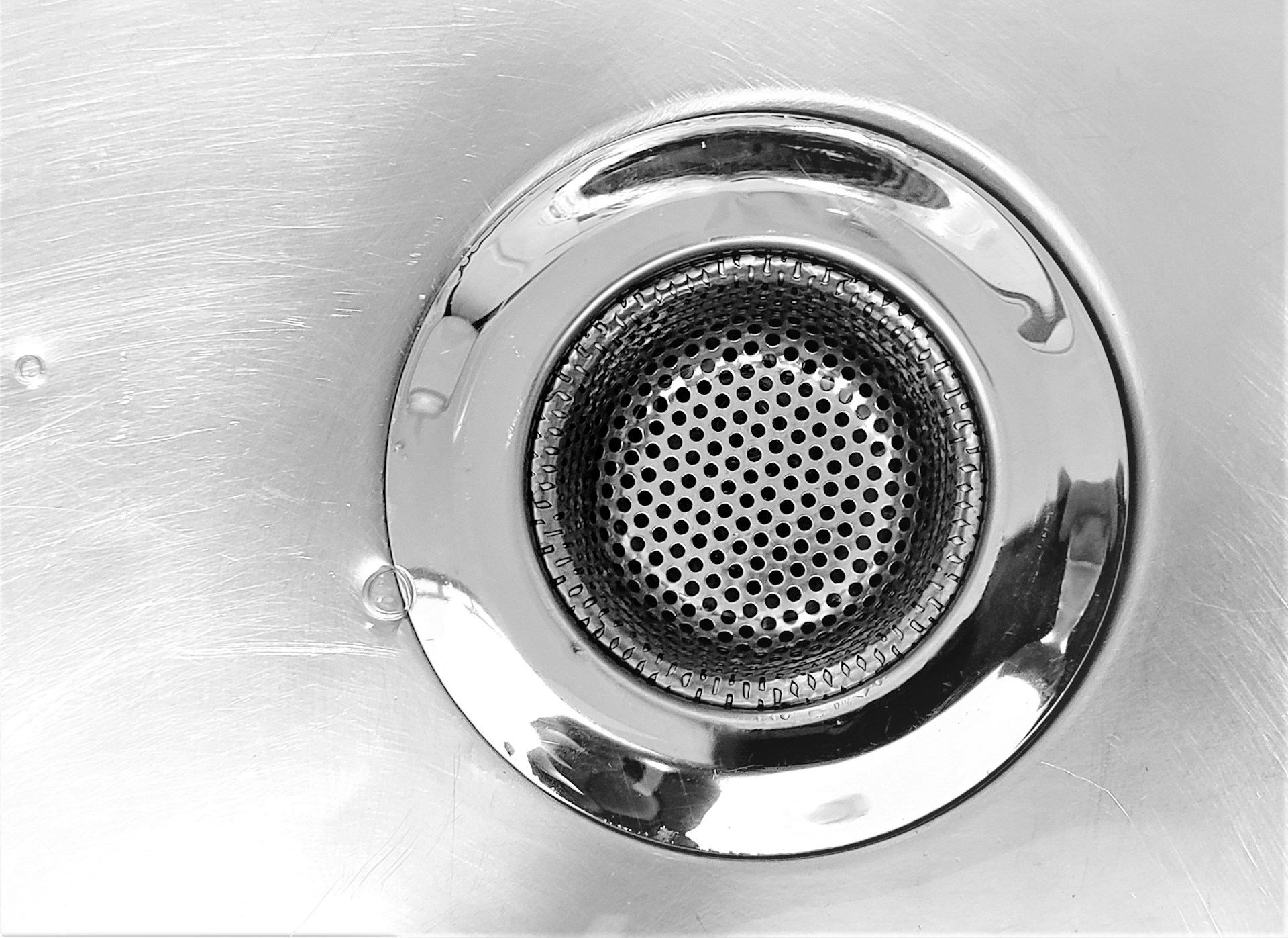 Close up image of a working drain