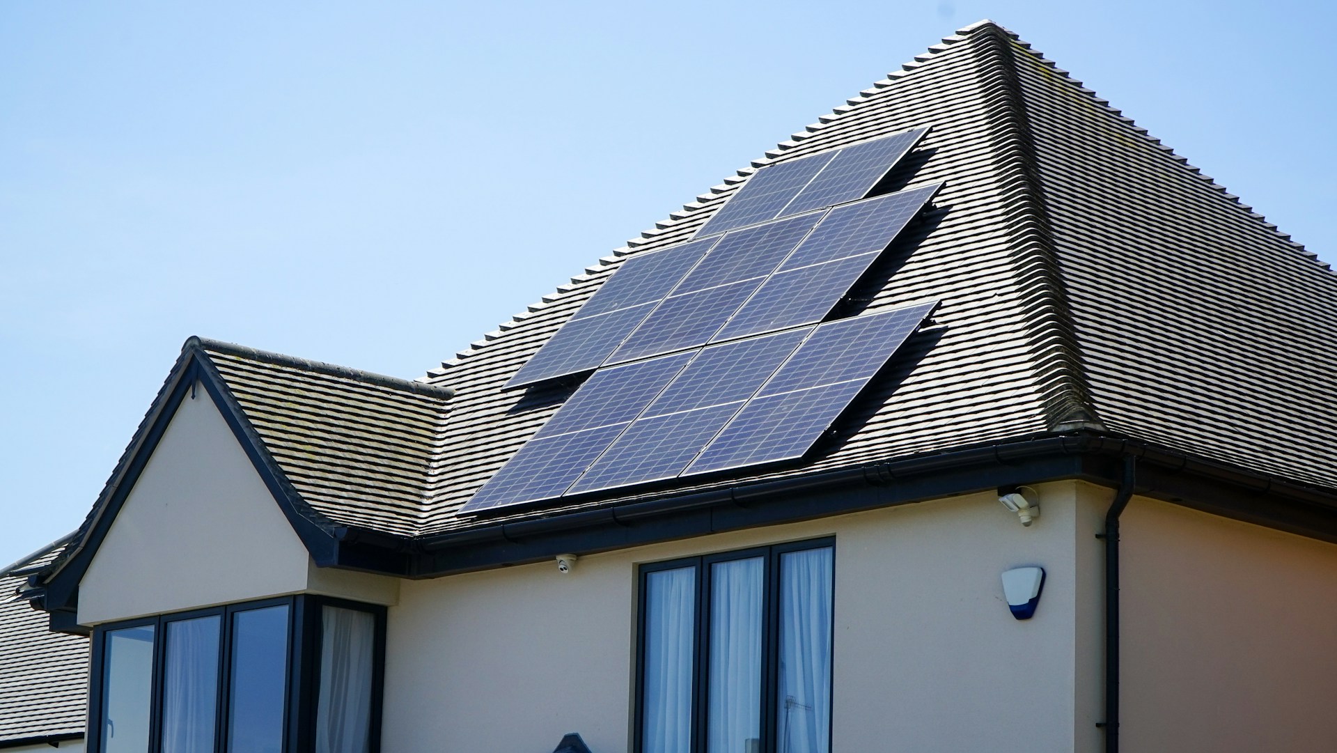 Close up image of a home with solar panels
